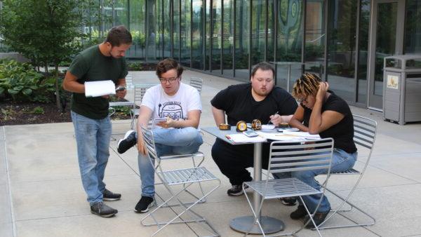 a group of people sitting at a table